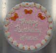 light pink frosting, orange butterflies